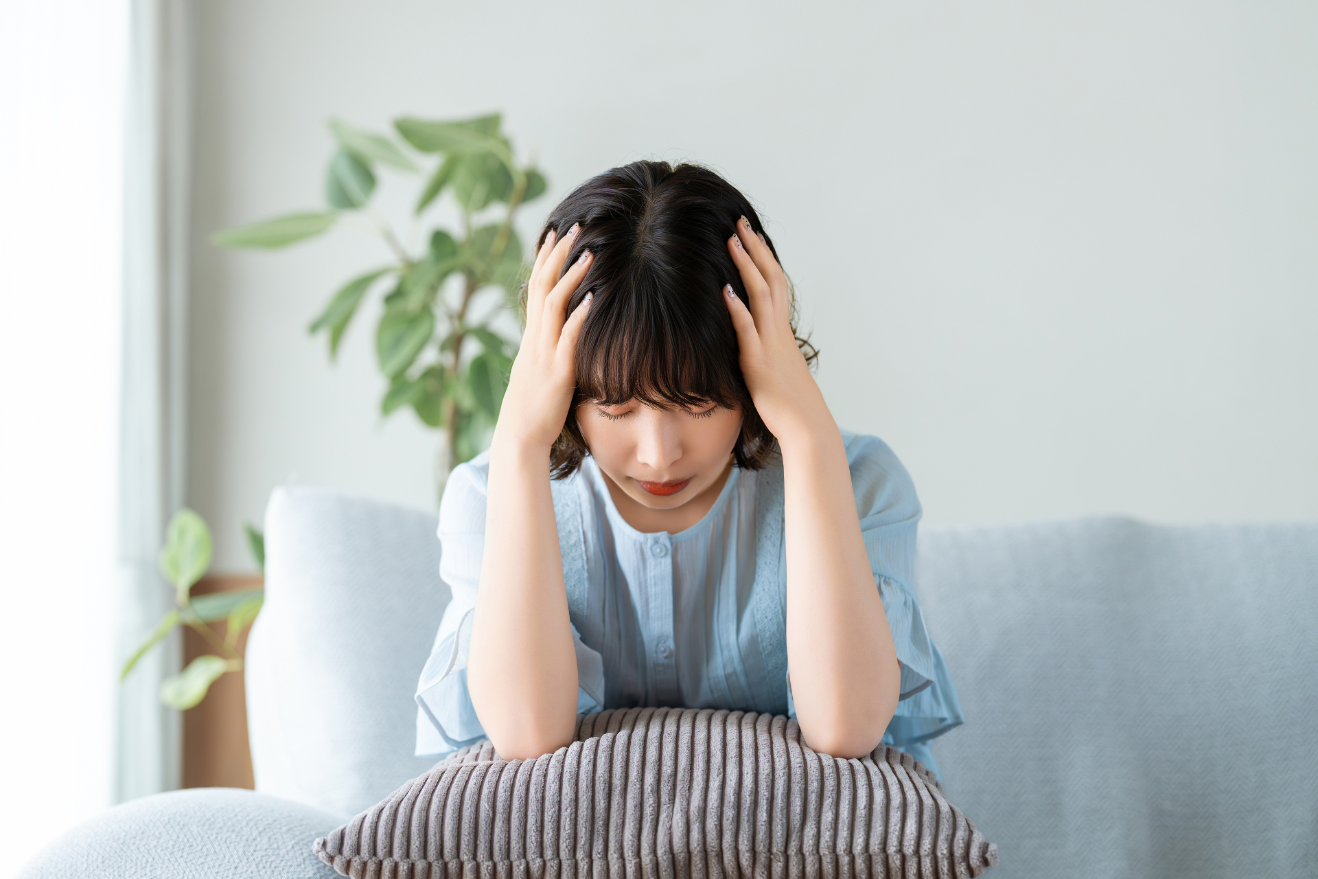 台風・低気圧の前後に頭痛やだるさを感じる様子